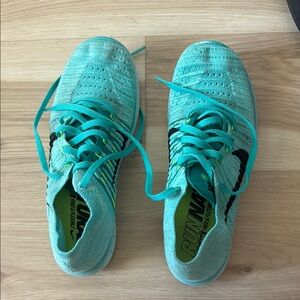 Nike Blue and Black Athletic Shoes with Lace-Up Design